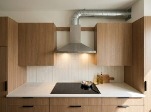 Range hood above an induction cooktop